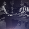 He worked the desk – she worked the room